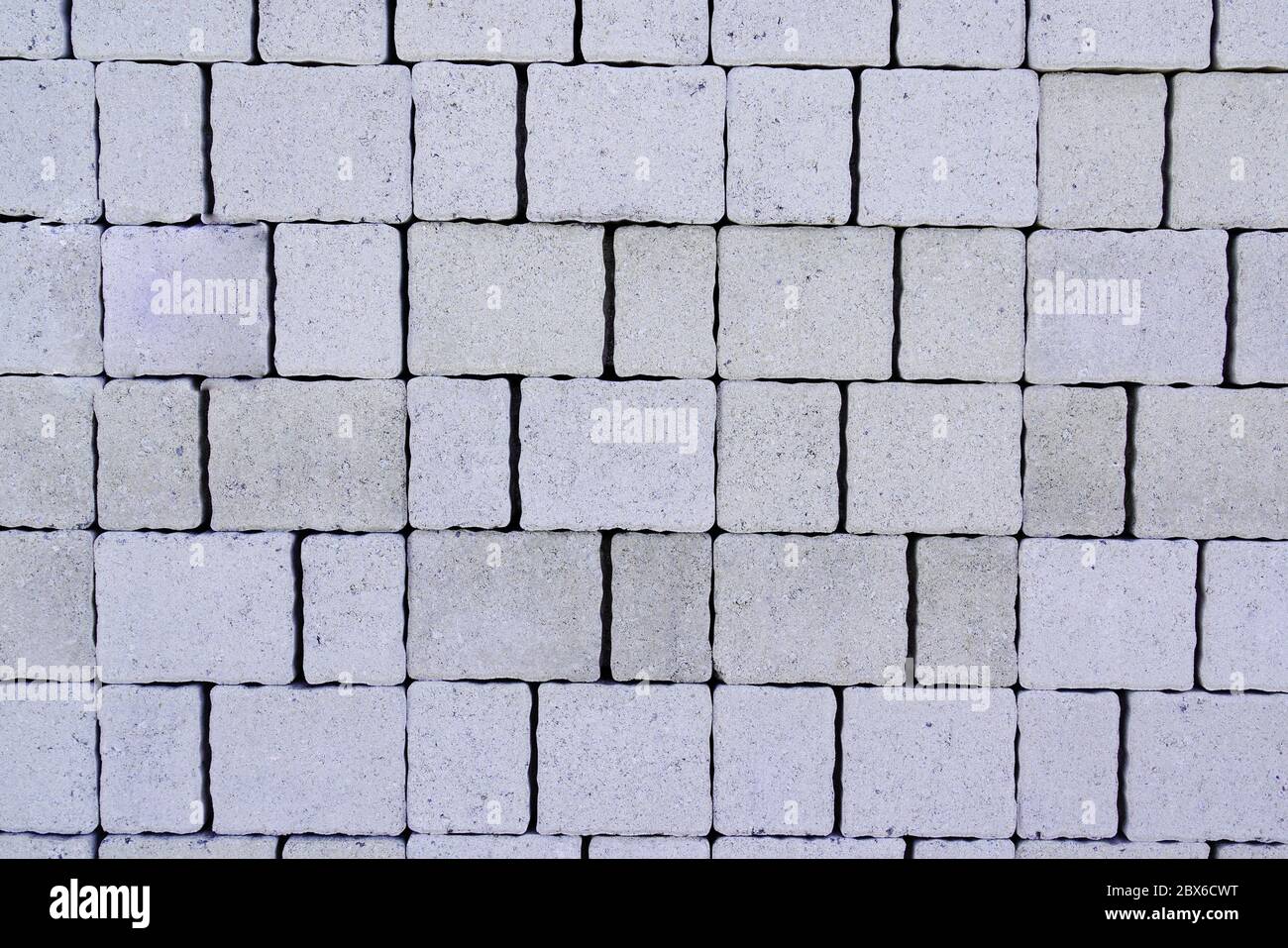 Struttura senza cuciture di fondo in ciottoli grigio Foto Stock