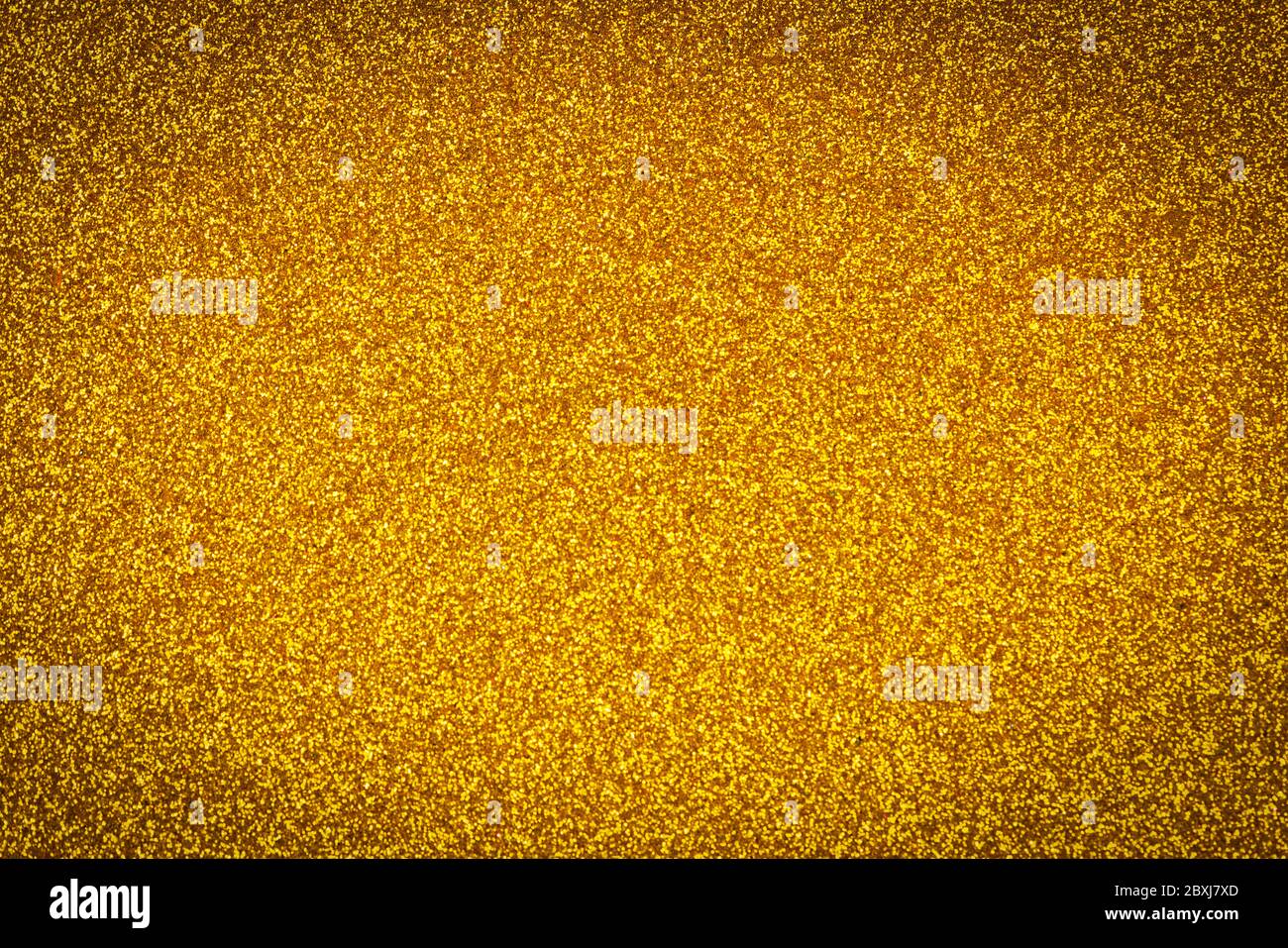 Sfondo astratto dorato. Twinkly Golden Lights Natale sfondo Foto Stock