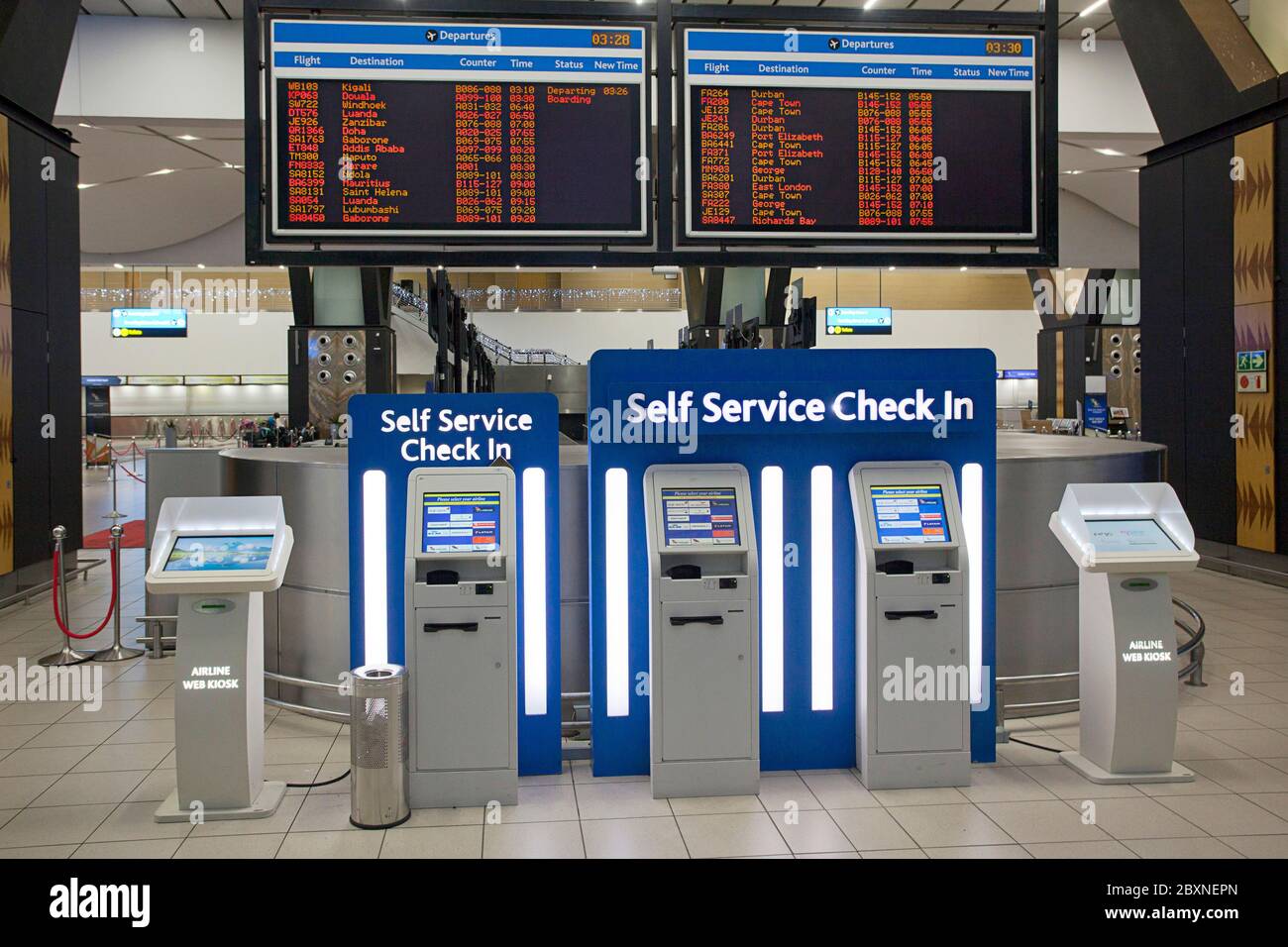Check-in self-service all'Aeroporto Internazionale O. R. Tambo. Foto Stock