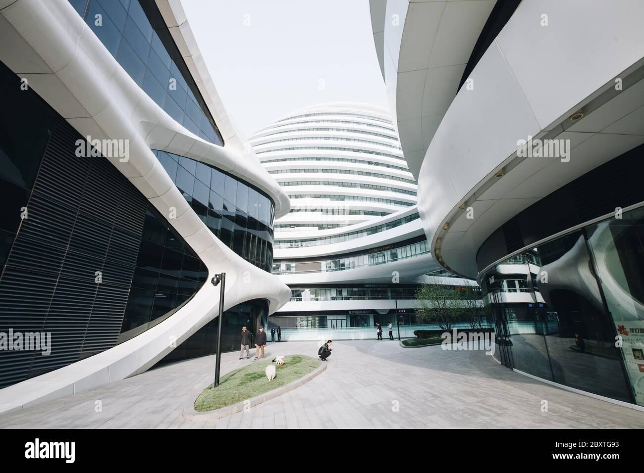 Pechino, Dongcheng District / Cina: Spettacolare architettura di Galaxy Soho da Zaha Hadid Foto Stock