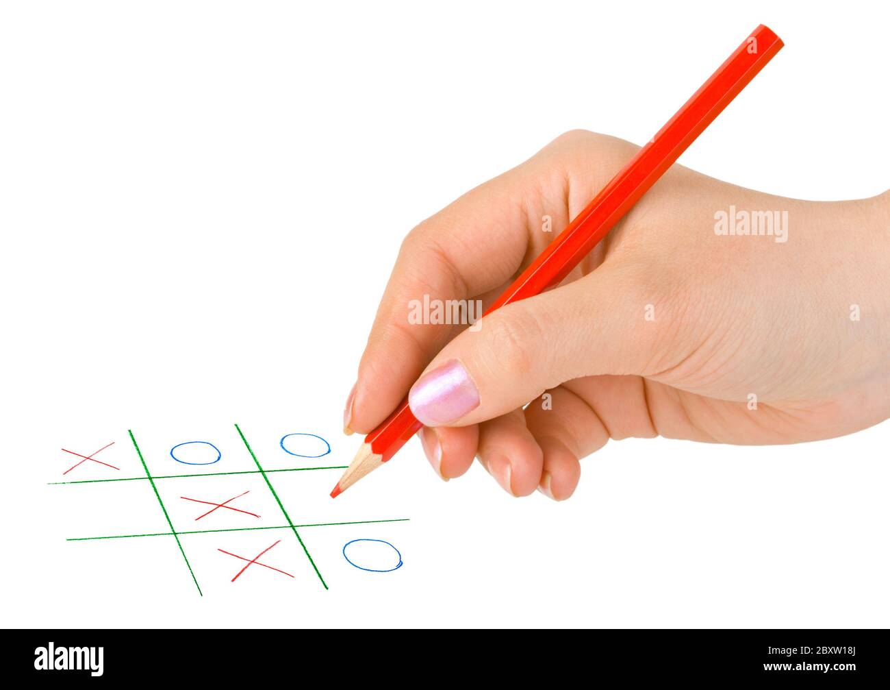 Mano con matita e gioco Foto Stock