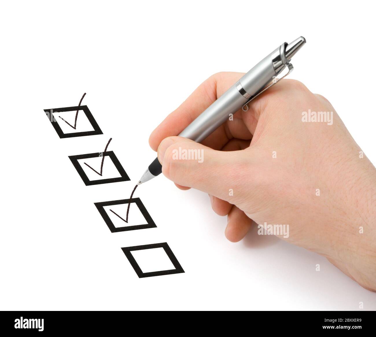 Mano con penna e caselle di controllo Foto Stock