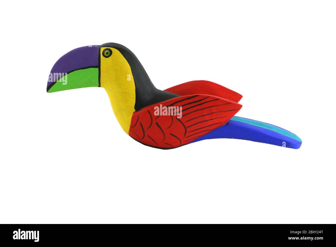 Un isolato dai colori vivaci di legno handcarved toucan Foto Stock