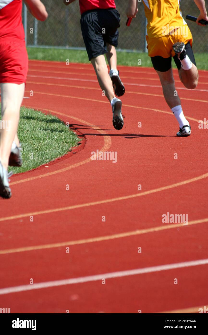 Guide di scorrimento in esecuzione in una gara su pista Foto Stock