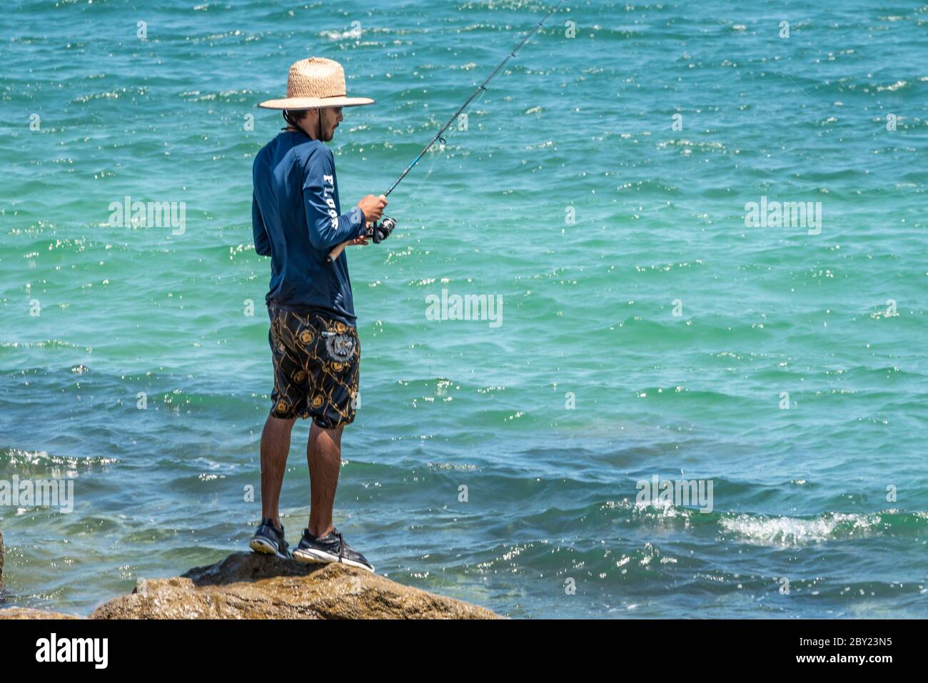 Pesca d'acqua salata a Ponce Inlet, tra Daytona Beach e New Smyrna Beach, Florida. (STATI UNITI) Foto Stock