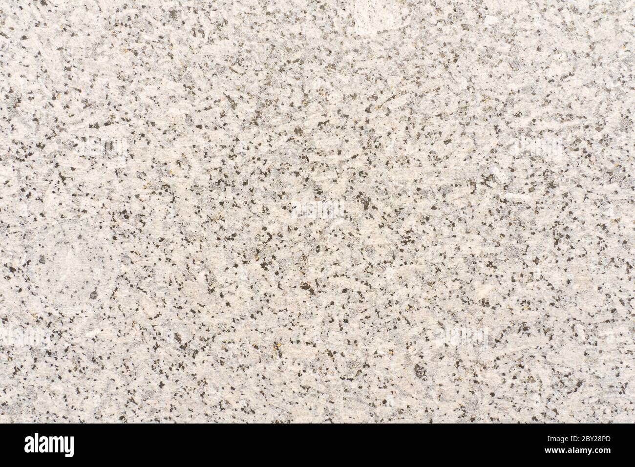 Sfondo chiaro e testurizzato. Primo piano con trucioli di marmo minerale. Intonacatura decorativa delle pareti, decorazione esterna della facciata. Foto Stock