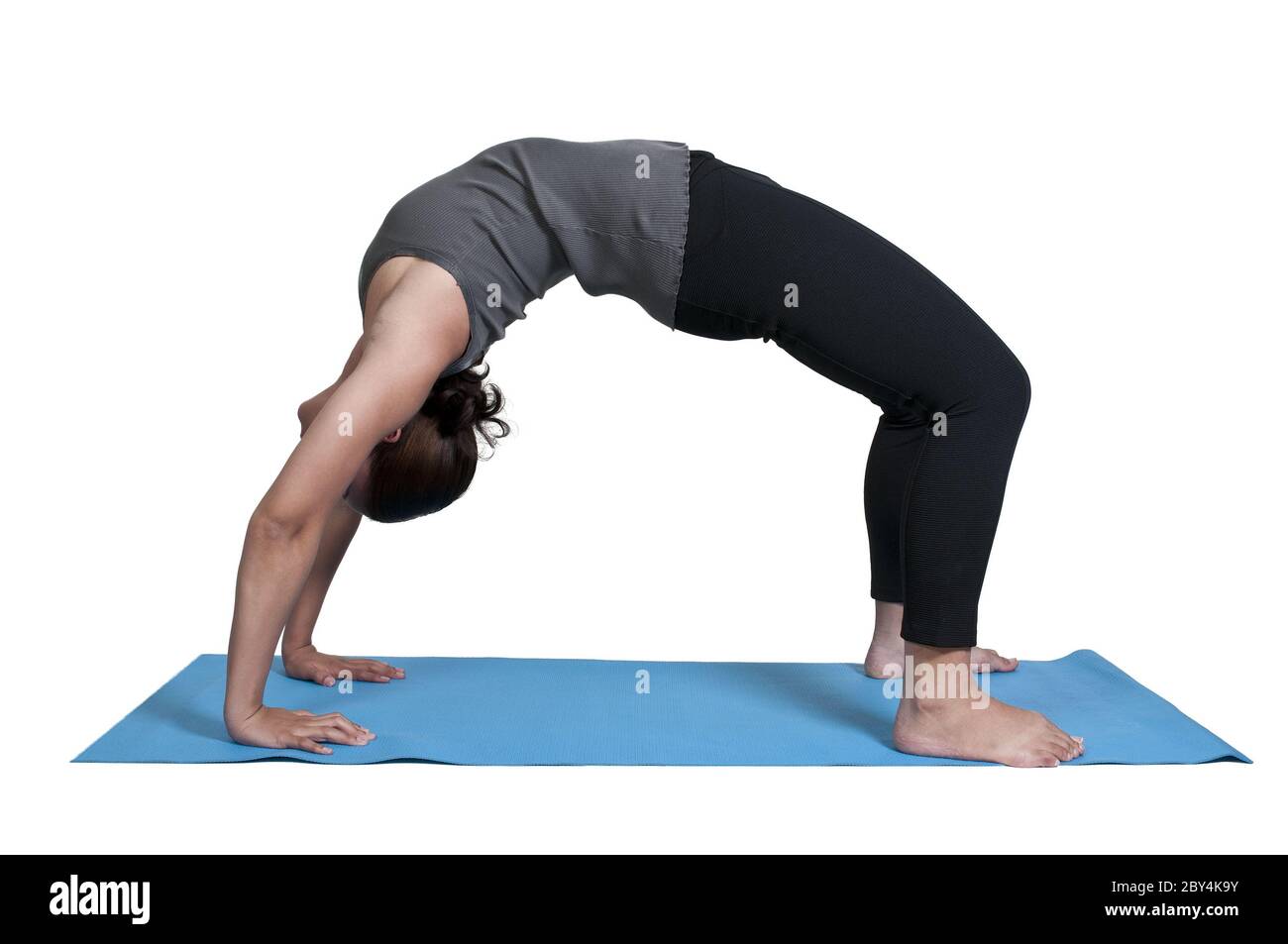 Donna fare yoga Foto Stock