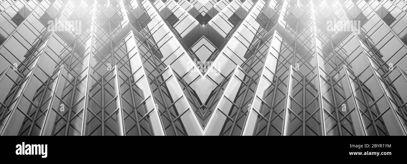 vista panoramica e prospettica dal lato inferiore dei grattacieli dell'edificio in vetro grigio acciaio, concetto di business di architettura industriale di successo Foto Stock