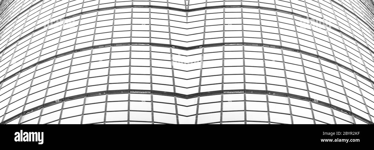 vista panoramica e prospettica dal lato inferiore dei grattacieli dell'edificio in vetro grigio acciaio, concetto di business di architettura industriale di successo Foto Stock