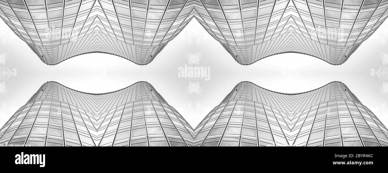 vista panoramica e prospettica dal lato inferiore dei grattacieli dell'edificio in vetro grigio acciaio, concetto di business di architettura industriale di successo Foto Stock