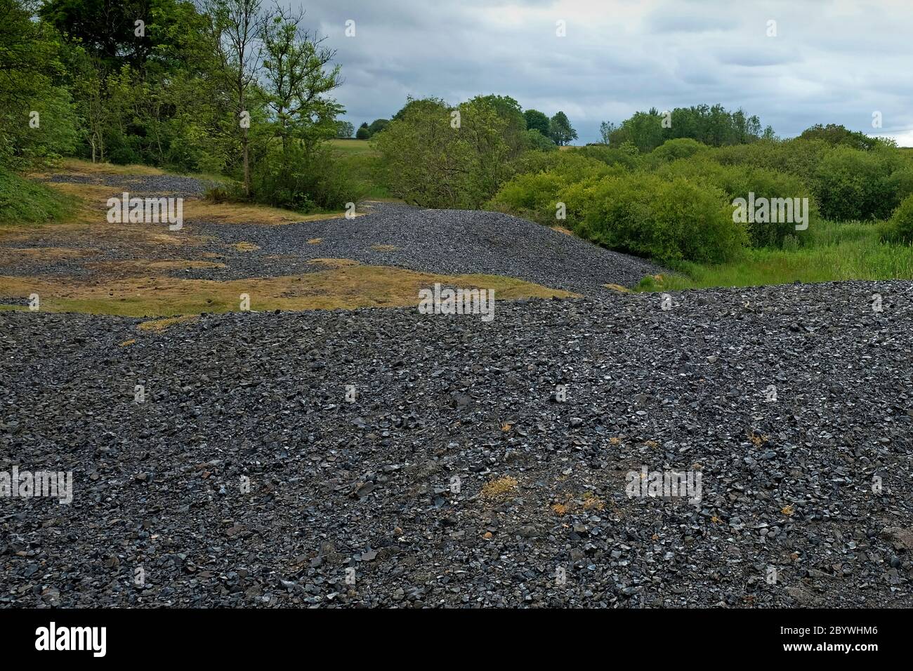 Fondo di velluto, Certosa, Somerset, UK, che mostra le scorie di piombo e i forni di derelict dalle opere di piombo vittoriane, che hanno rielaborato le lavorazioni romane. Foto Stock