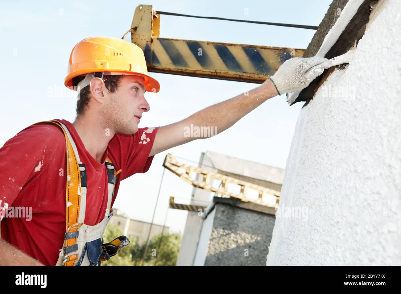 Facciata builder pittore al lavoro Foto Stock