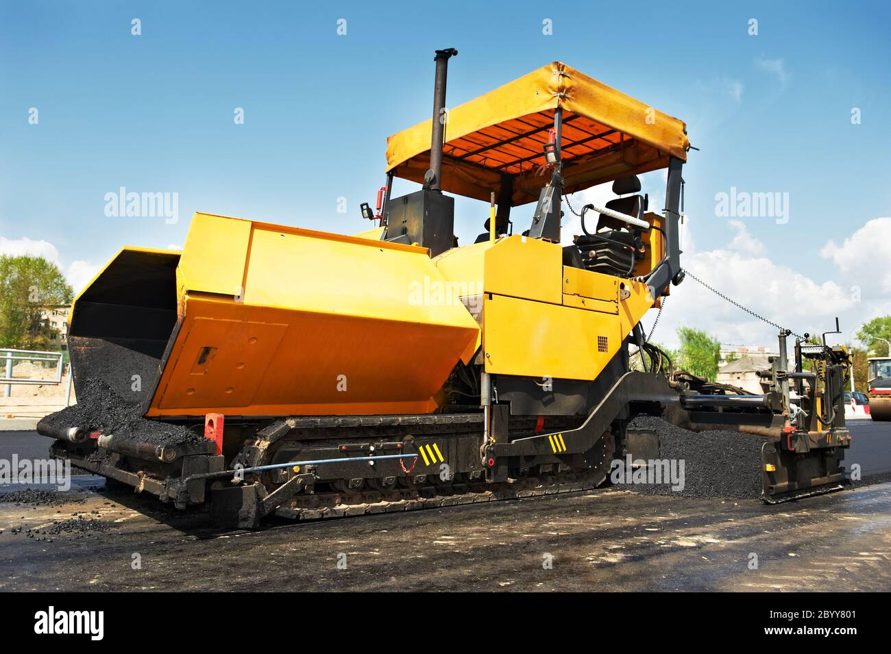 asfaltatrice cingolata Foto Stock