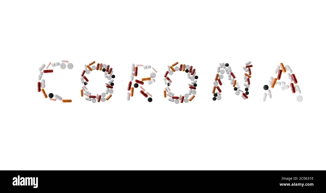 Pillole colorate, compresse formano la parola corona, immagine simbolica malattia e corona pandemia, sfondo bianco, Germania, Germania Foto Stock