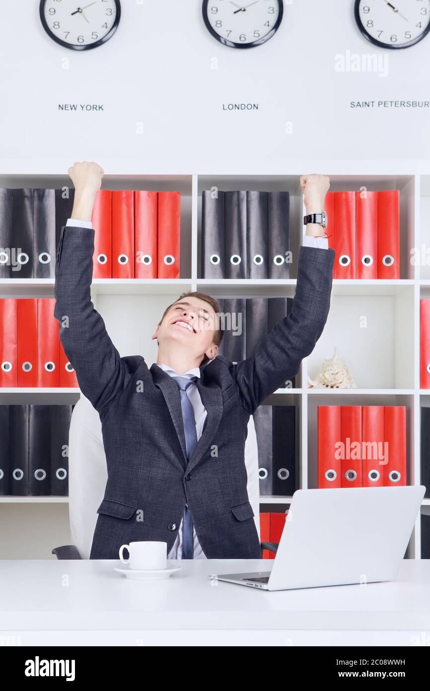 Giovane Imprenditore trionfo Foto Stock