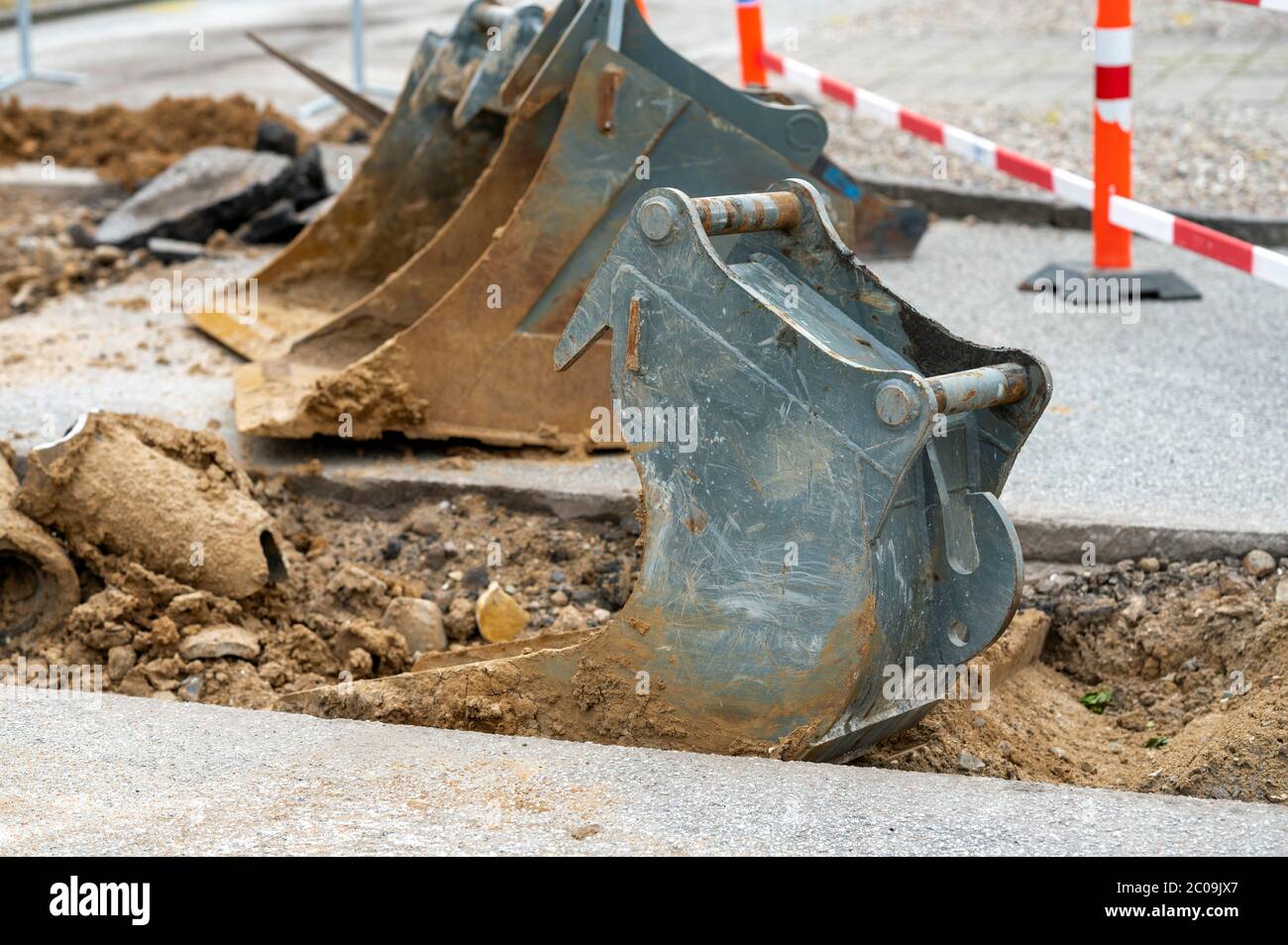 3 Shovels per un escavatore su strada Foto Stock