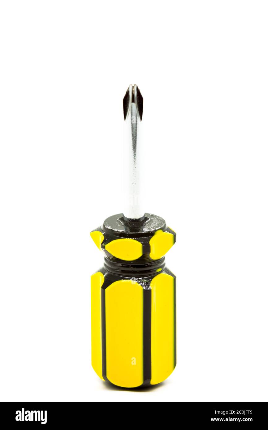 Cacciavite piccolo con punta a stella. Messa a fuoco selettiva con profondità di campo ridotta. Foto Stock