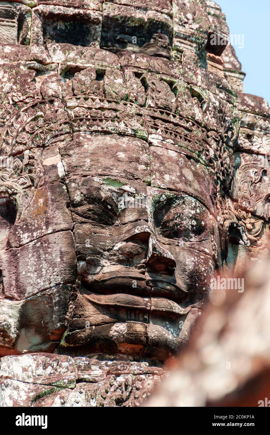 Capo encarved in pietra tempio Bayon Angkor Foto Stock