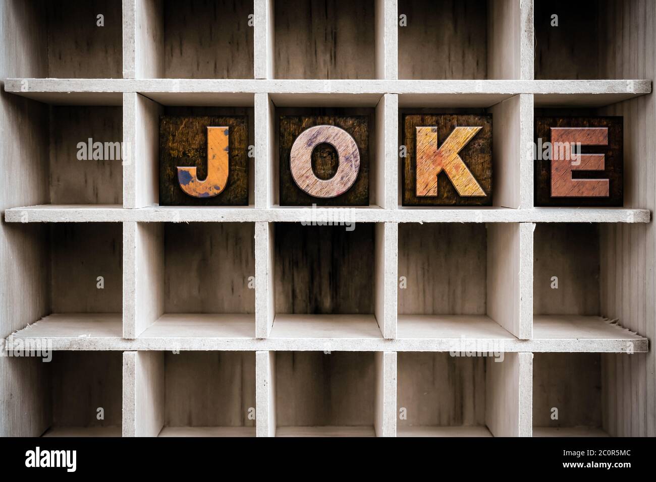 Joke Concept Letterpress in legno tipo in disegno Foto Stock