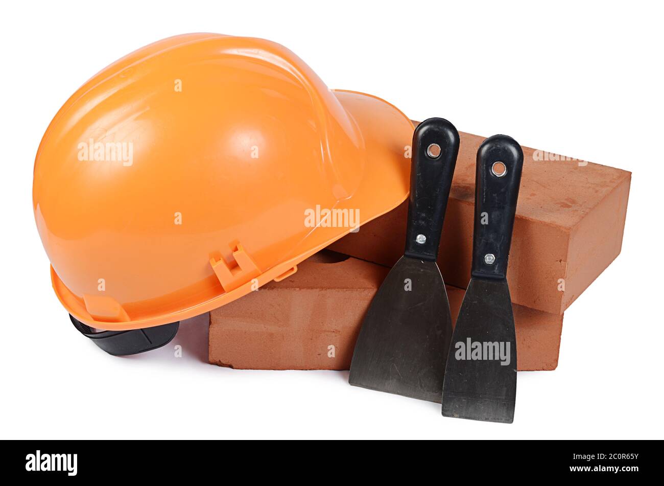 Mattone di Edificio con un casco Foto Stock