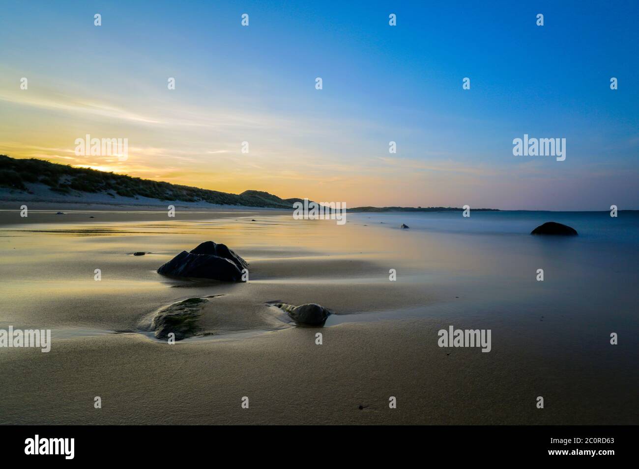Dunstanburgh Castle Beach, Northumberland Foto Stock