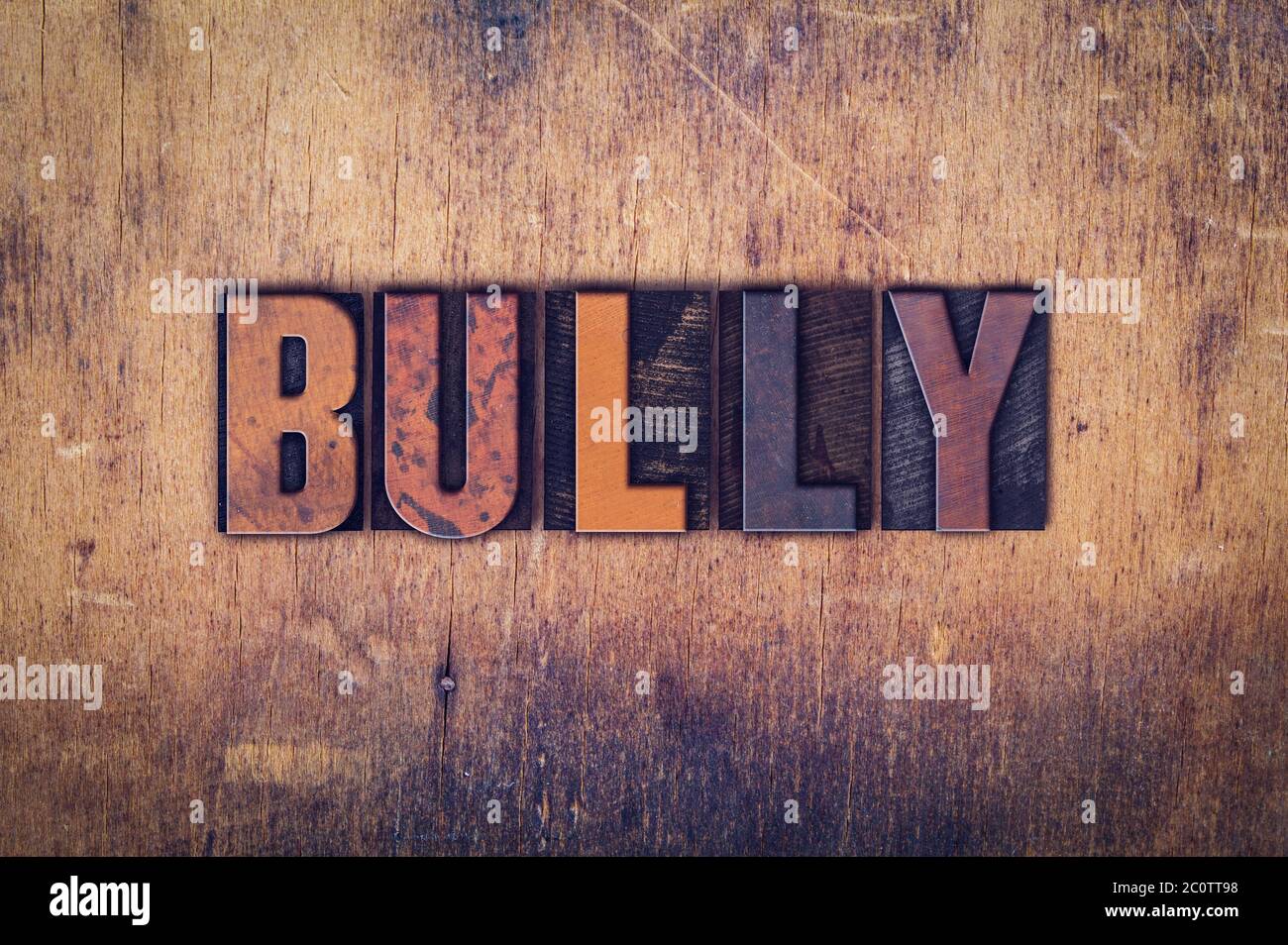 Tipo di pressa per lettere in legno Bully Concept Foto Stock