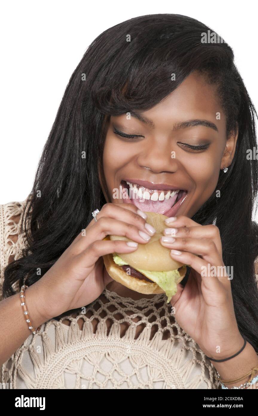 Donna con Hambrger Foto Stock