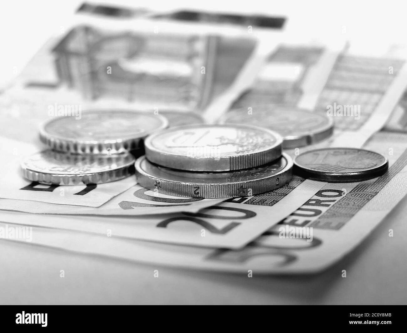 Euro monete e banconote Foto Stock