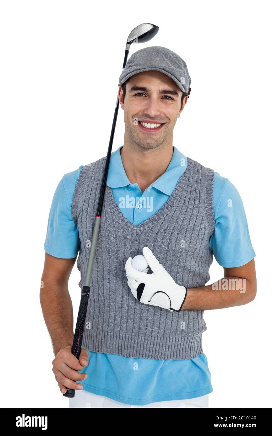 Ritratto del giocatore di golf in piedi con la pallina da golf e golf club Foto Stock