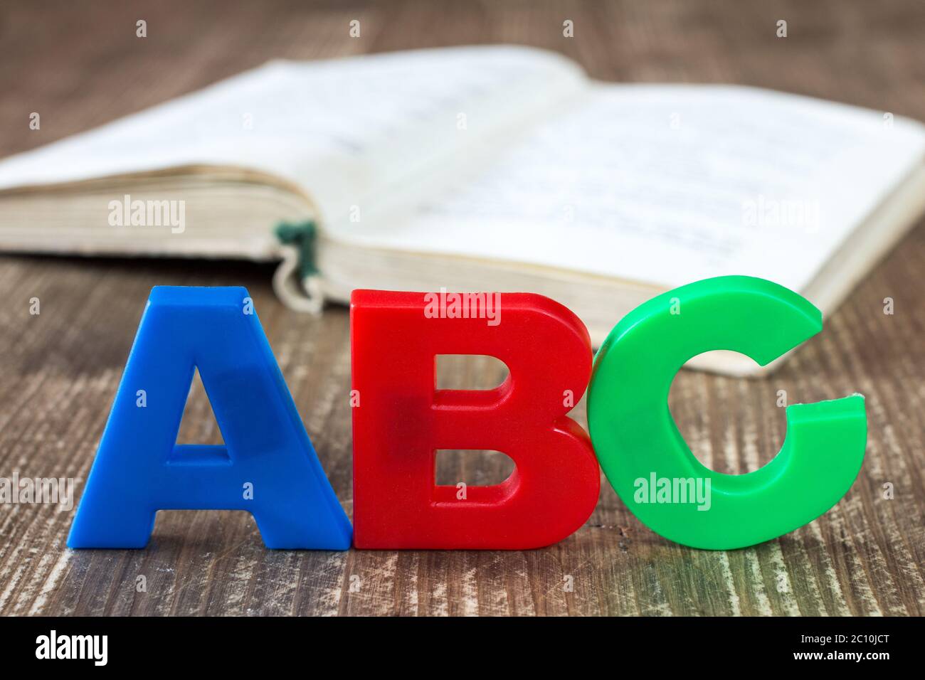 ABC di ortografia e libro aperto Foto Stock