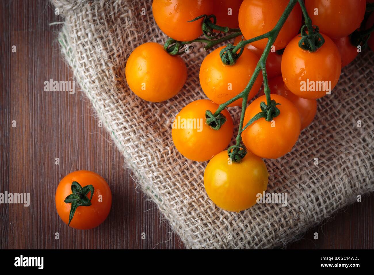 Pomodori ciliegini d'arancia freschi Foto Stock