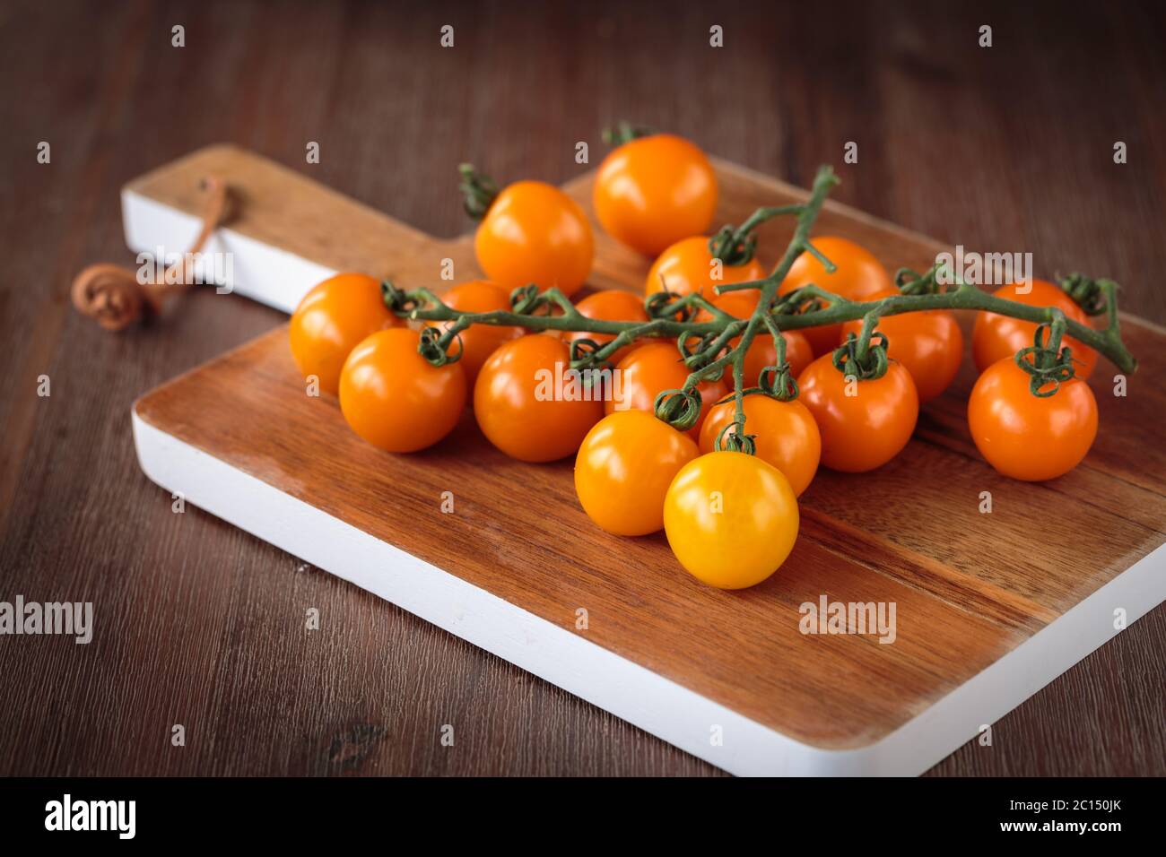 Pomodori ciliegini d'arancia freschi Foto Stock