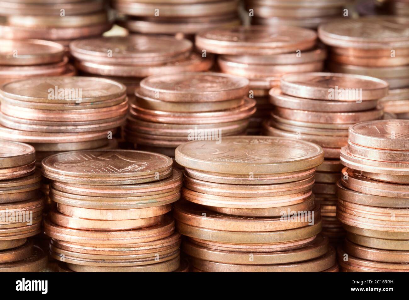 Pile di monete di rame Foto Stock