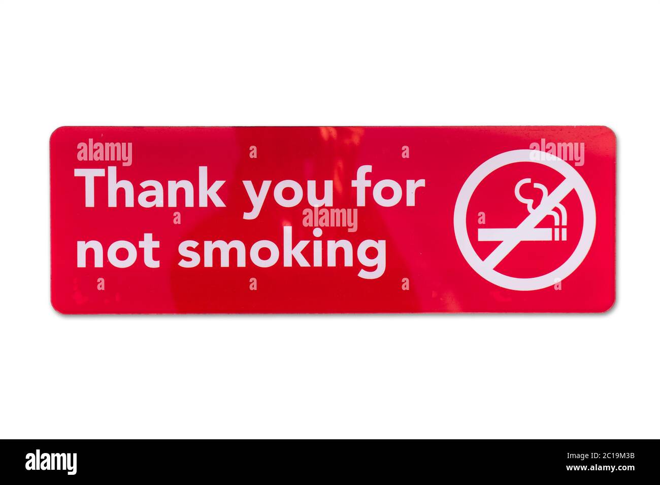 Cartello di avvertenza - grazie per non fumare. Banner area non fumatori con simbolo e testo barrati. Icona rossa isolata in bianco Foto Stock