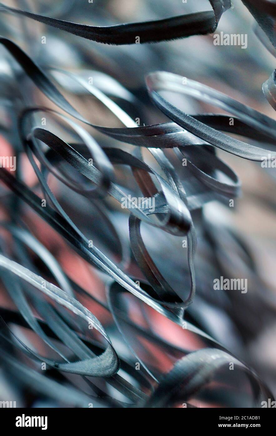 immagine astratta di trucioli di rasatura in metallo provenienti da tornio industriale Foto Stock