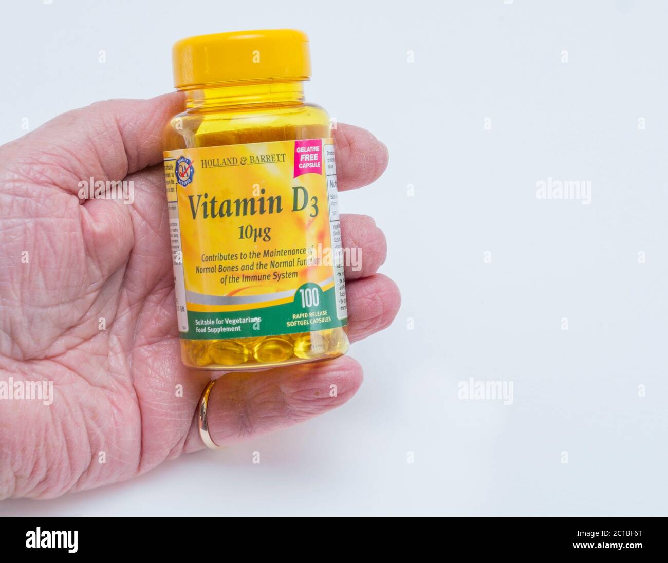 Una bottiglia di supplemento di vitamina D. Foto Stock