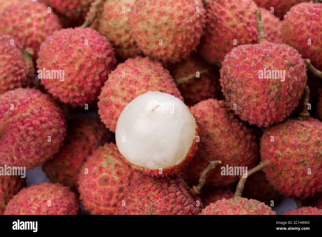 litchi con sfondo bianco Foto Stock