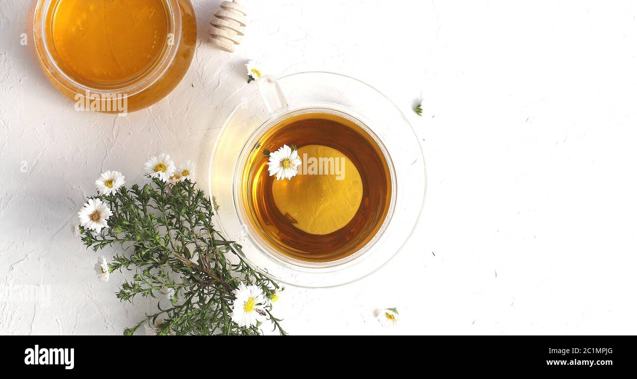 Tazza di tè e la tazza di miele Foto Stock