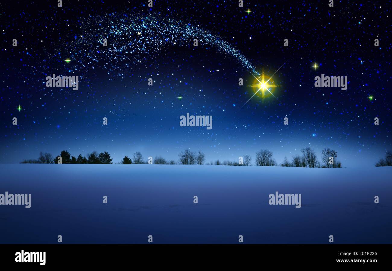 Natale Stella e blu astratto cielo.Natale sfondo. Foto Stock