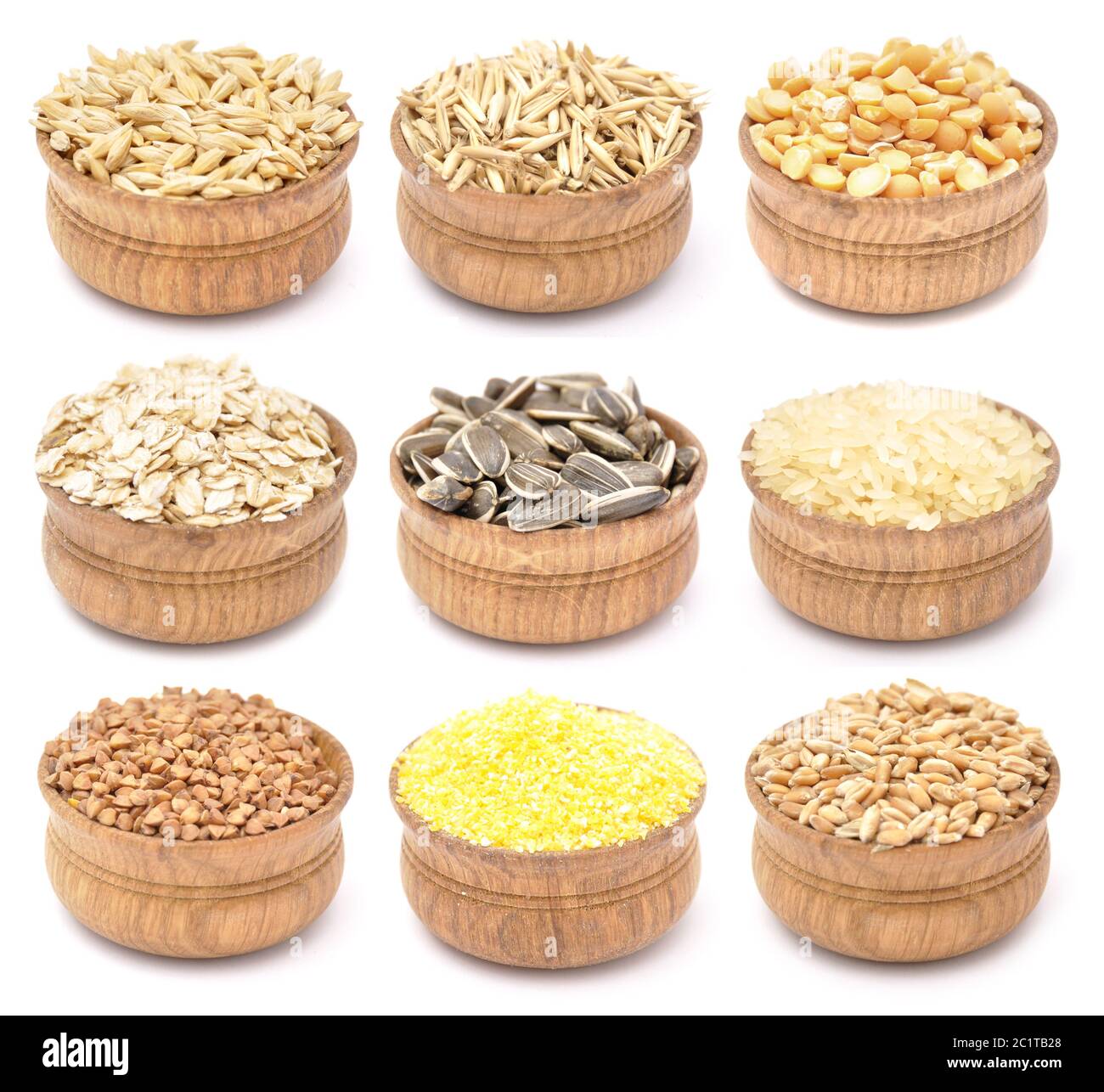 Cereali in ciotole di legno Foto Stock