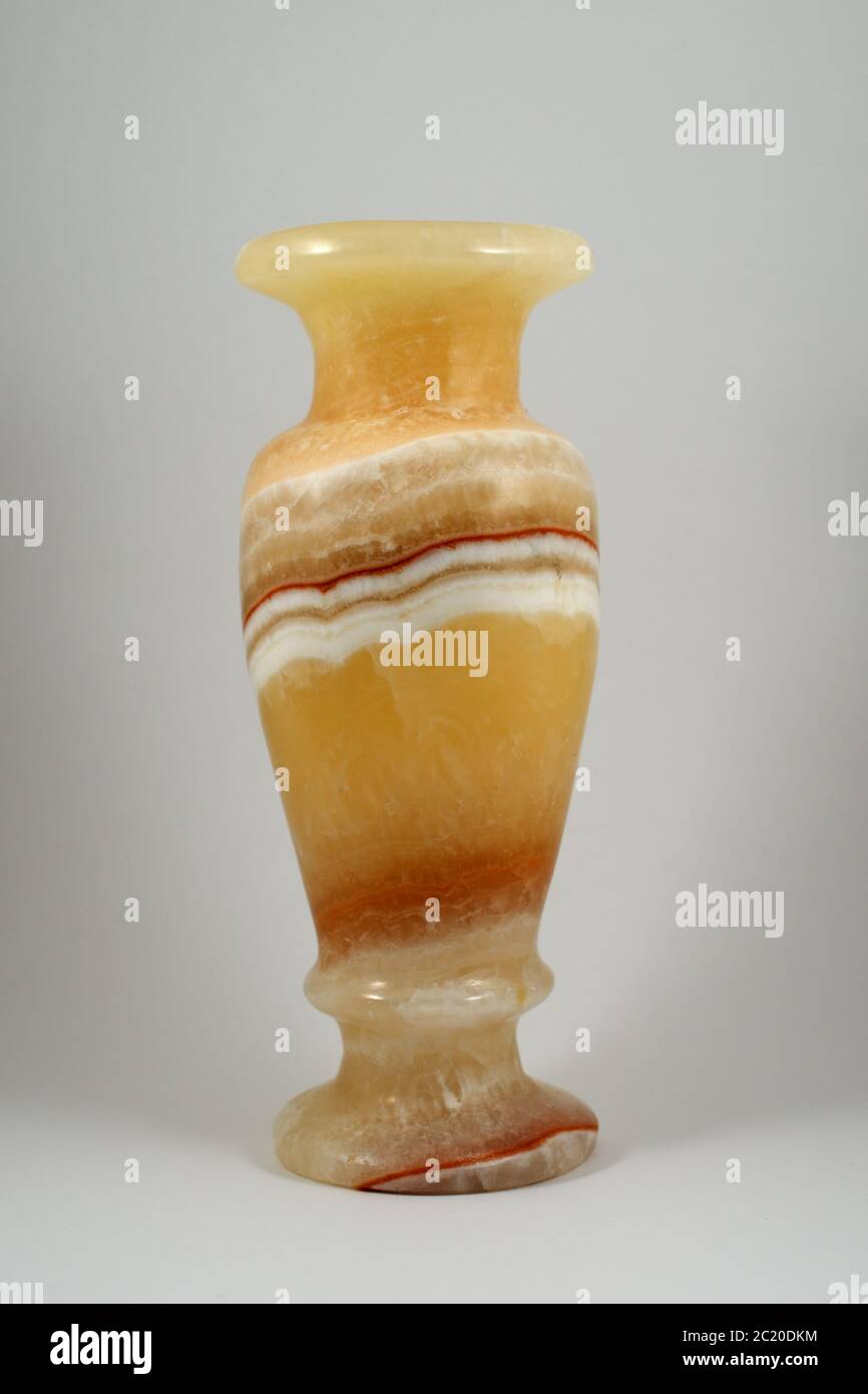 vaso di marmo onice su sfondo neutro Foto Stock