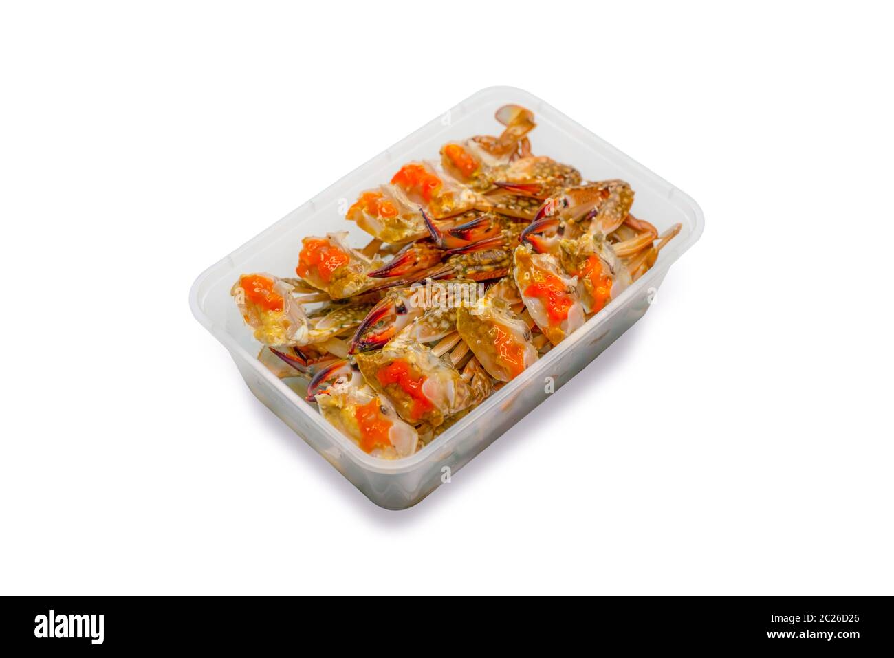 Decapare il granchio uova in salsa di pesce pack in scatola di plastica per la consegna. Frutti di mare business di consegna. Menu esotici in Thailandia. Decapare il granchio uova in usa e getta Foto Stock