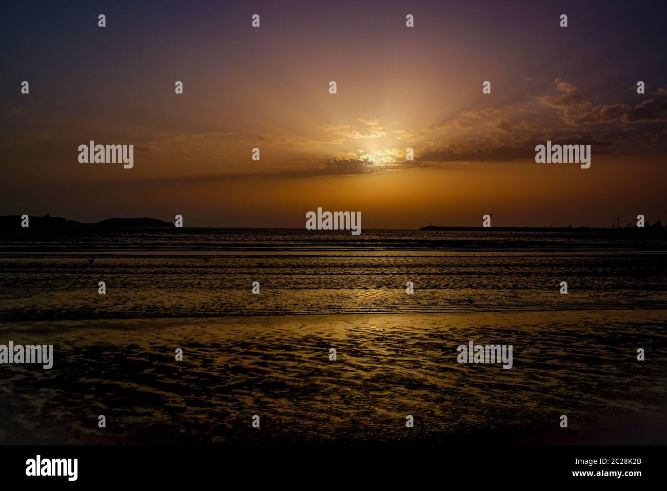 Spiaggia Essaouira/Marocco - tramonto su una sera d'estate Foto Stock