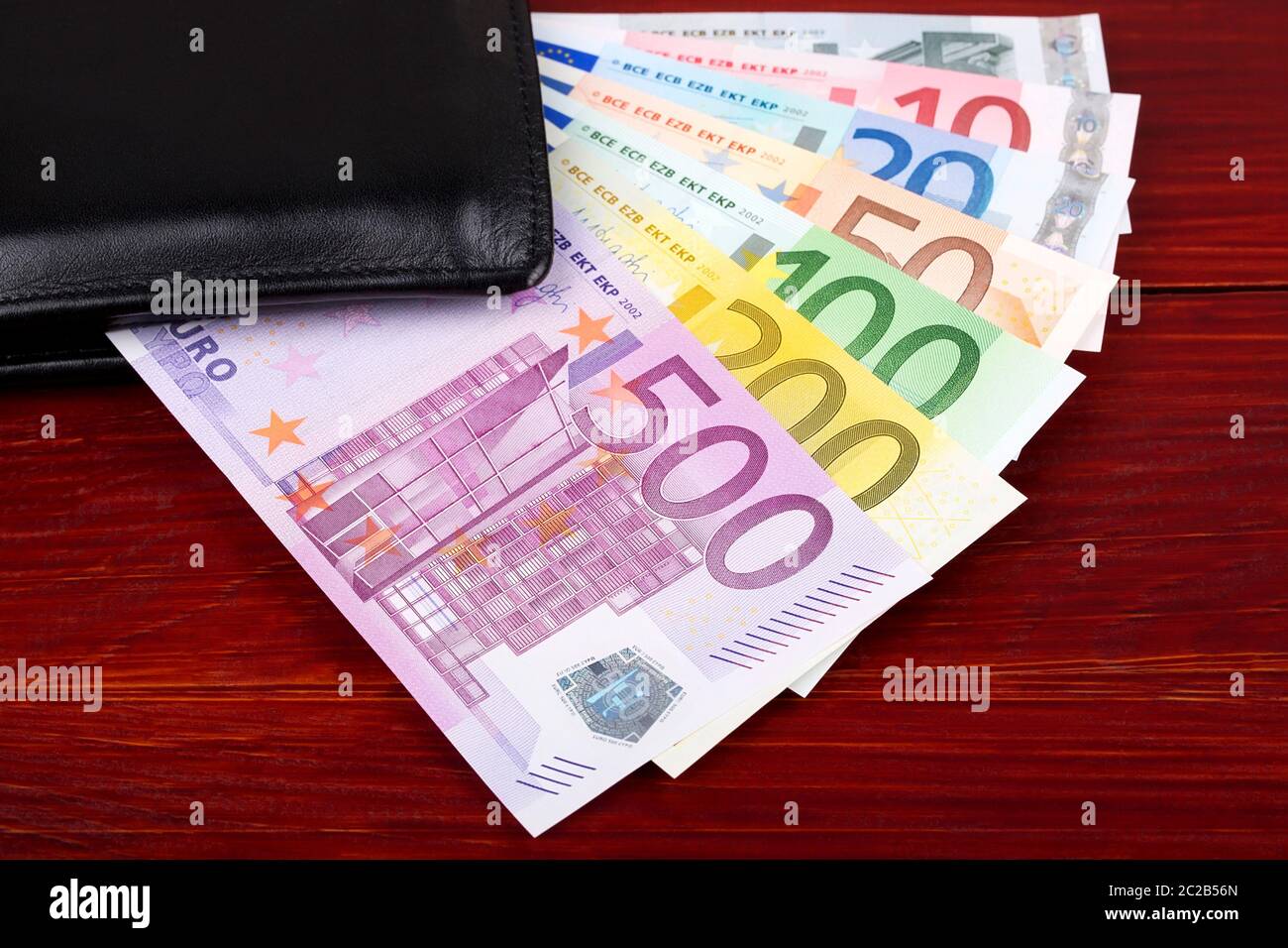 Il denaro europeo nel portafoglio nero Foto Stock