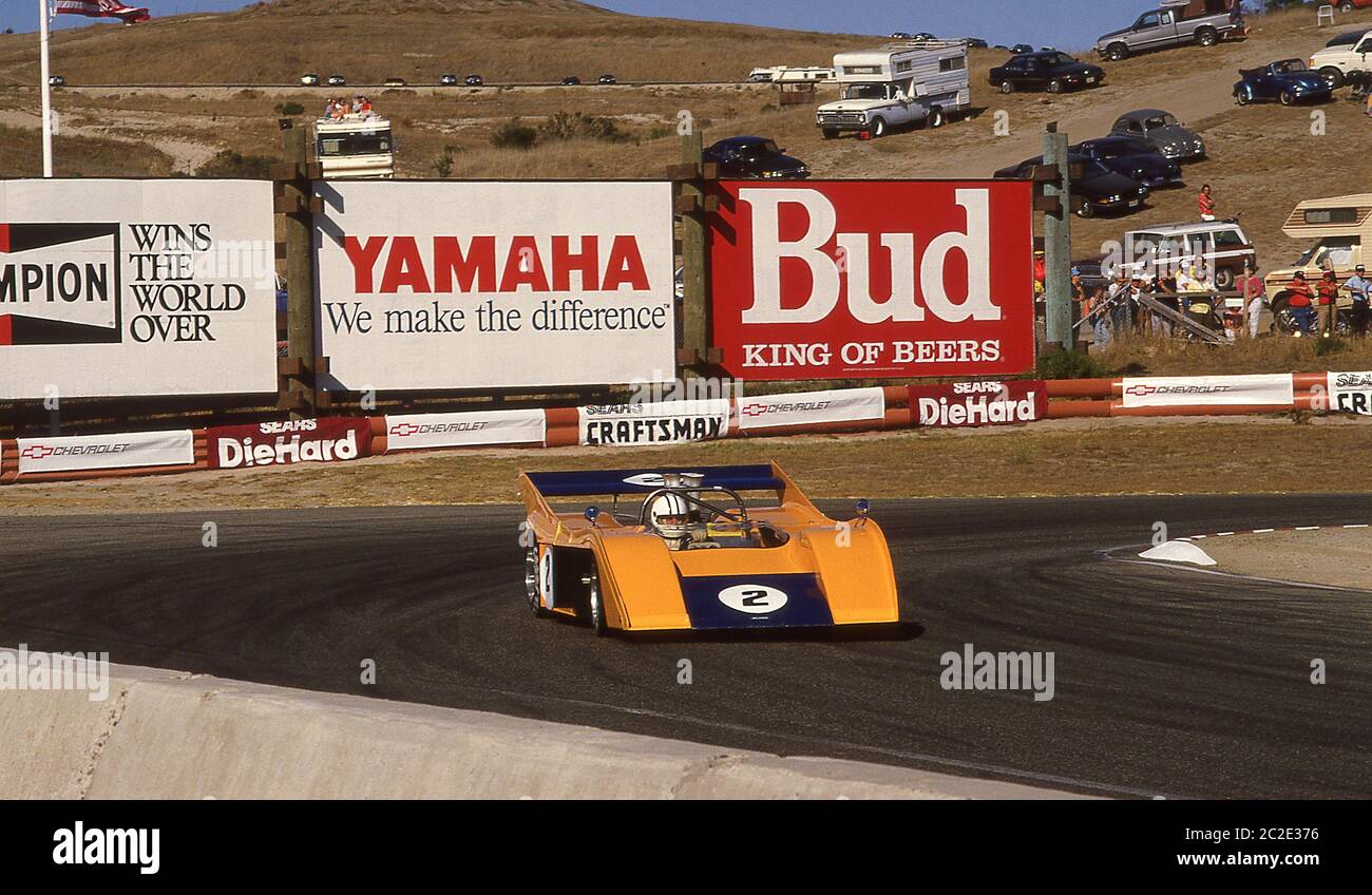 1987 Monterey Automobile storico gare Laguna Seca California. Denny Hulme in un CAN-Am McLaren M20 1972 Foto Stock
