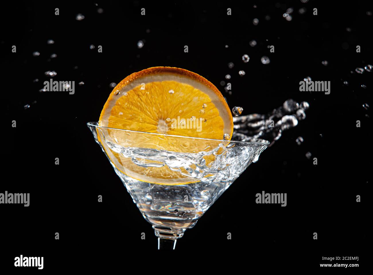 Arancio, vetro, ghiaccio e acqua Foto Stock