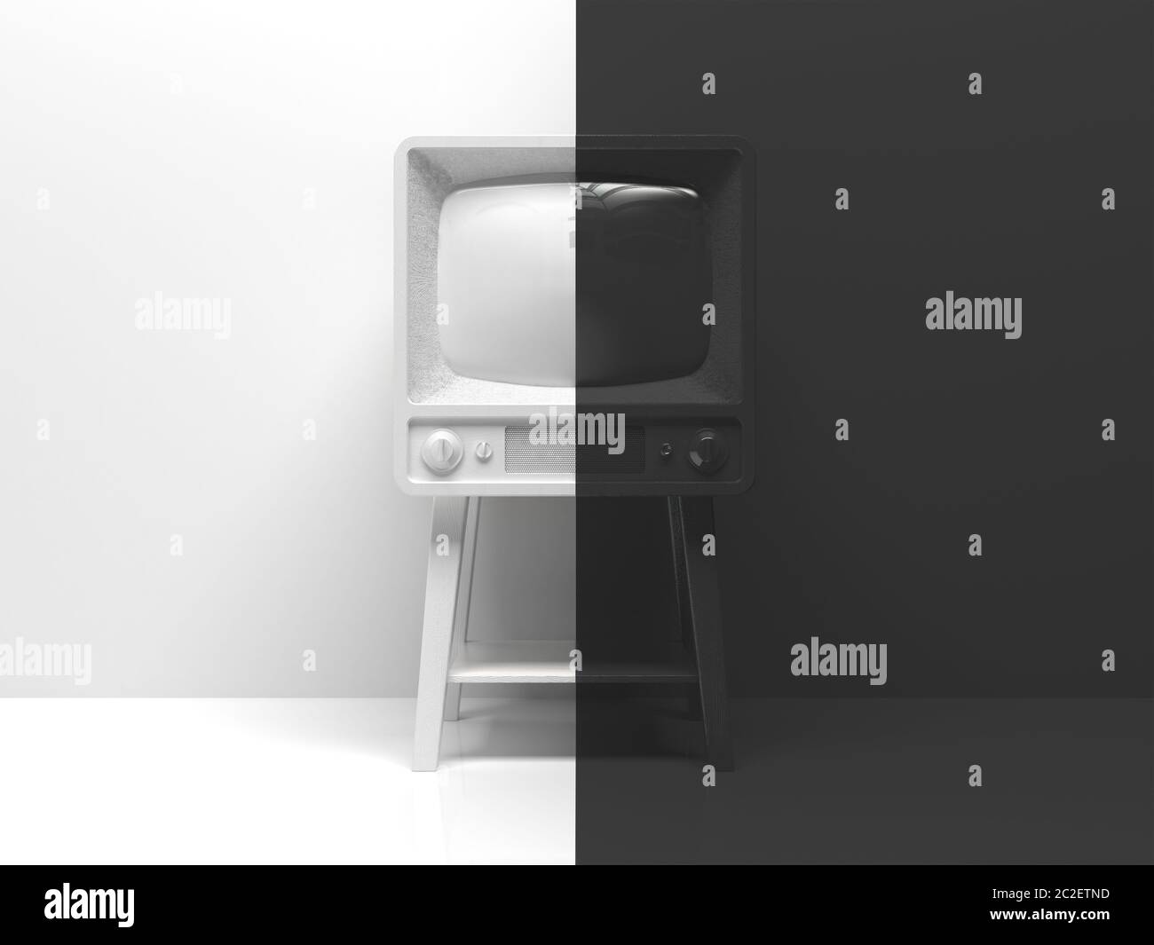 La vecchia tv in bianco e nero all'interno diviso a metà in due parti al centro. Una metà è bianca, l'altra metà è nera. Concettuale creativo Foto Stock