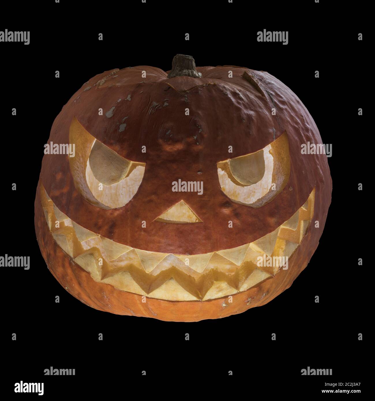 Halloween spaventosa testa di zucca su sfondo nero Foto Stock