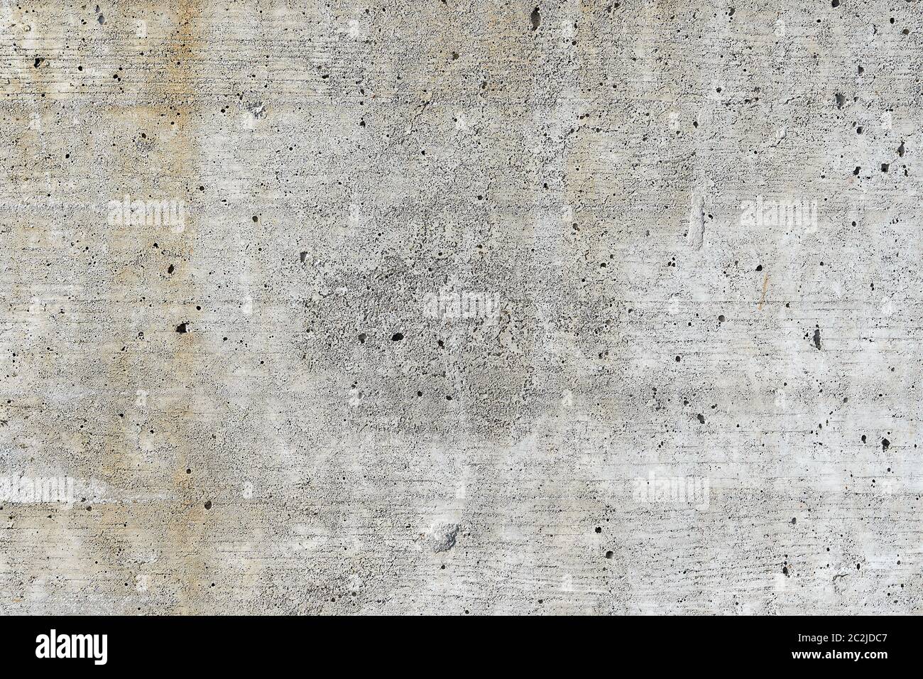 Superficie porosa di un muro di cemento Foto Stock