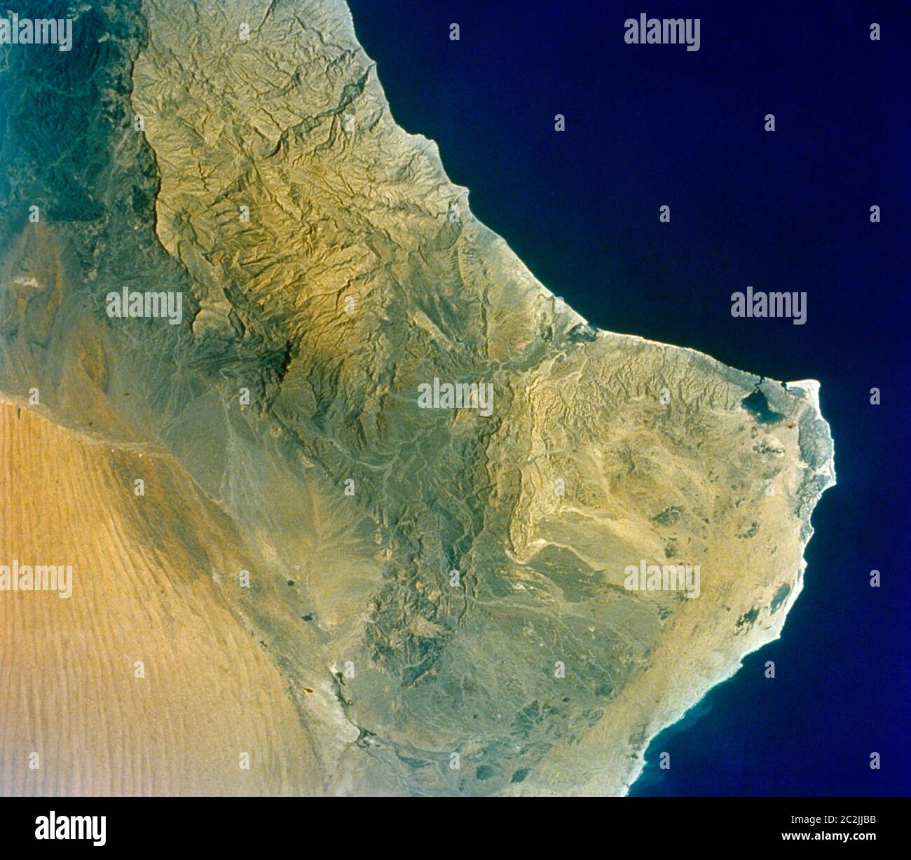 Muscat & Oman - Punta orientale della Penisola Araba visto dallo spazio Foto Stock